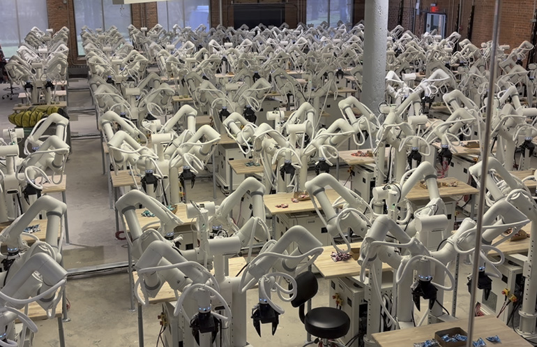 Tutor Intelligence built DF1: 100 robots running real-world tasks simultaneously.