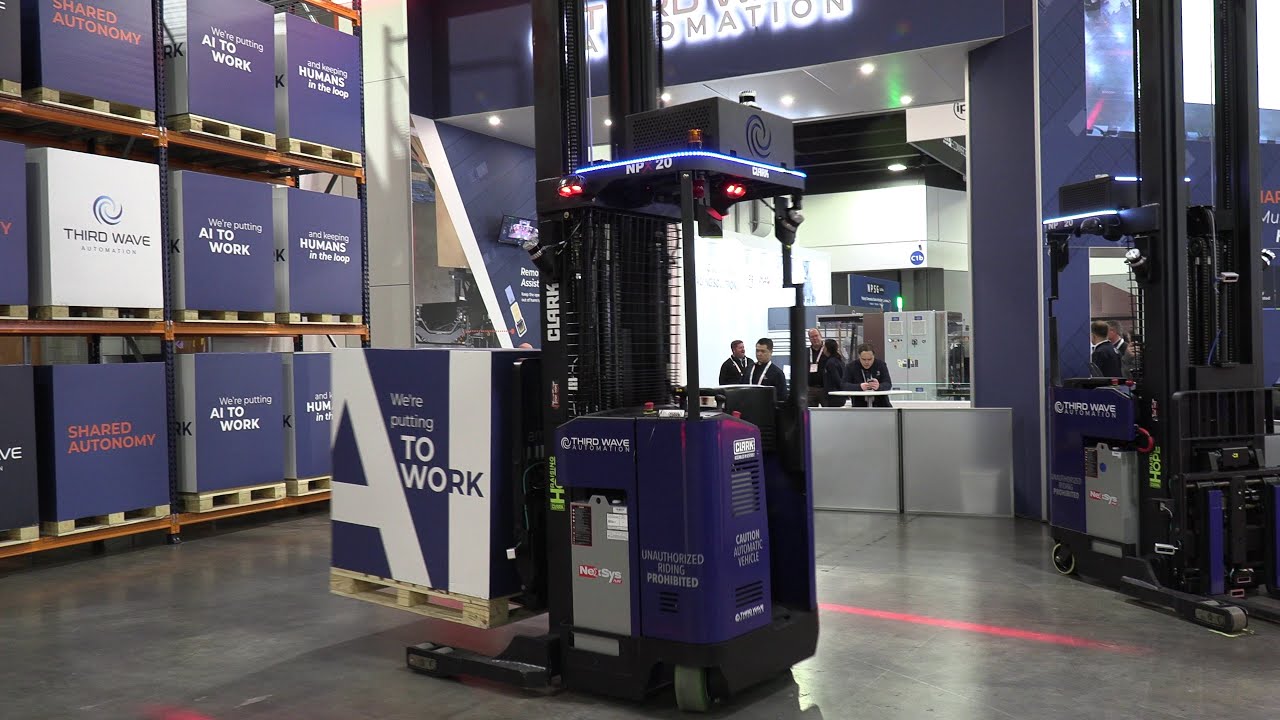TWA Reach autonomous forklift with advanced navigation and robotic lifting capabilities.