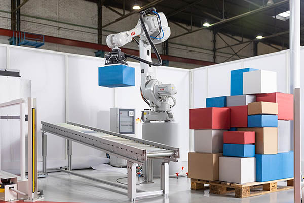 ABB robotic arms automate box lifting, stacking, and palletizing in warehouses and distribution centers.
